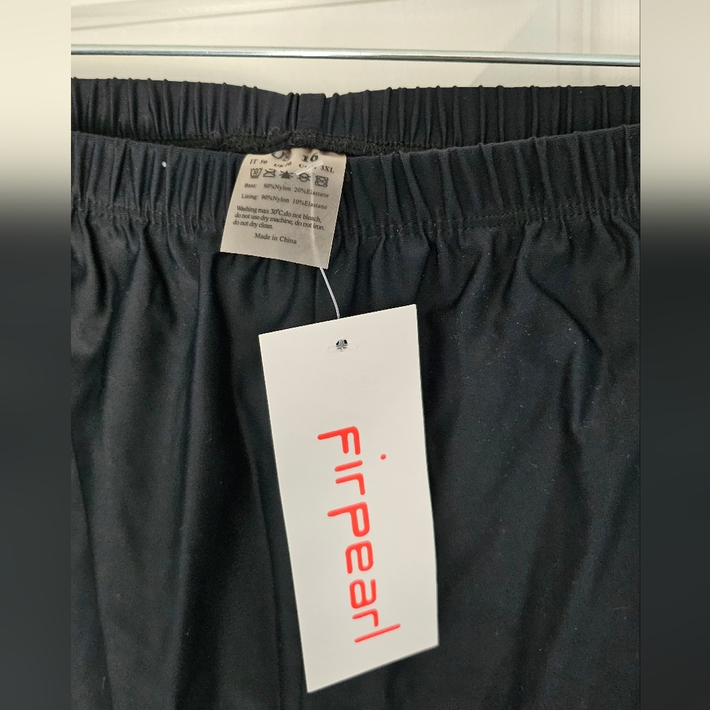 Womens size 16 NEW-never worn black swim shorts.